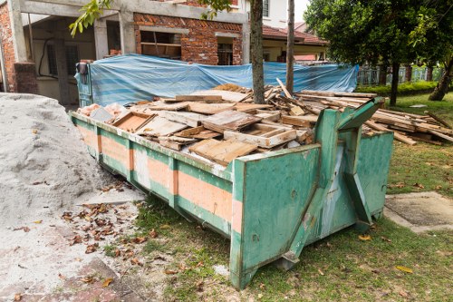 Construction site debris being cleared in Rickmansworth.