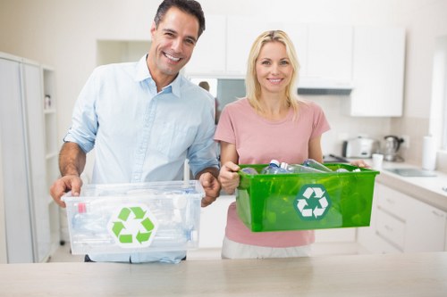 Satisfied homeowners enjoying a clutter-free space after clearance